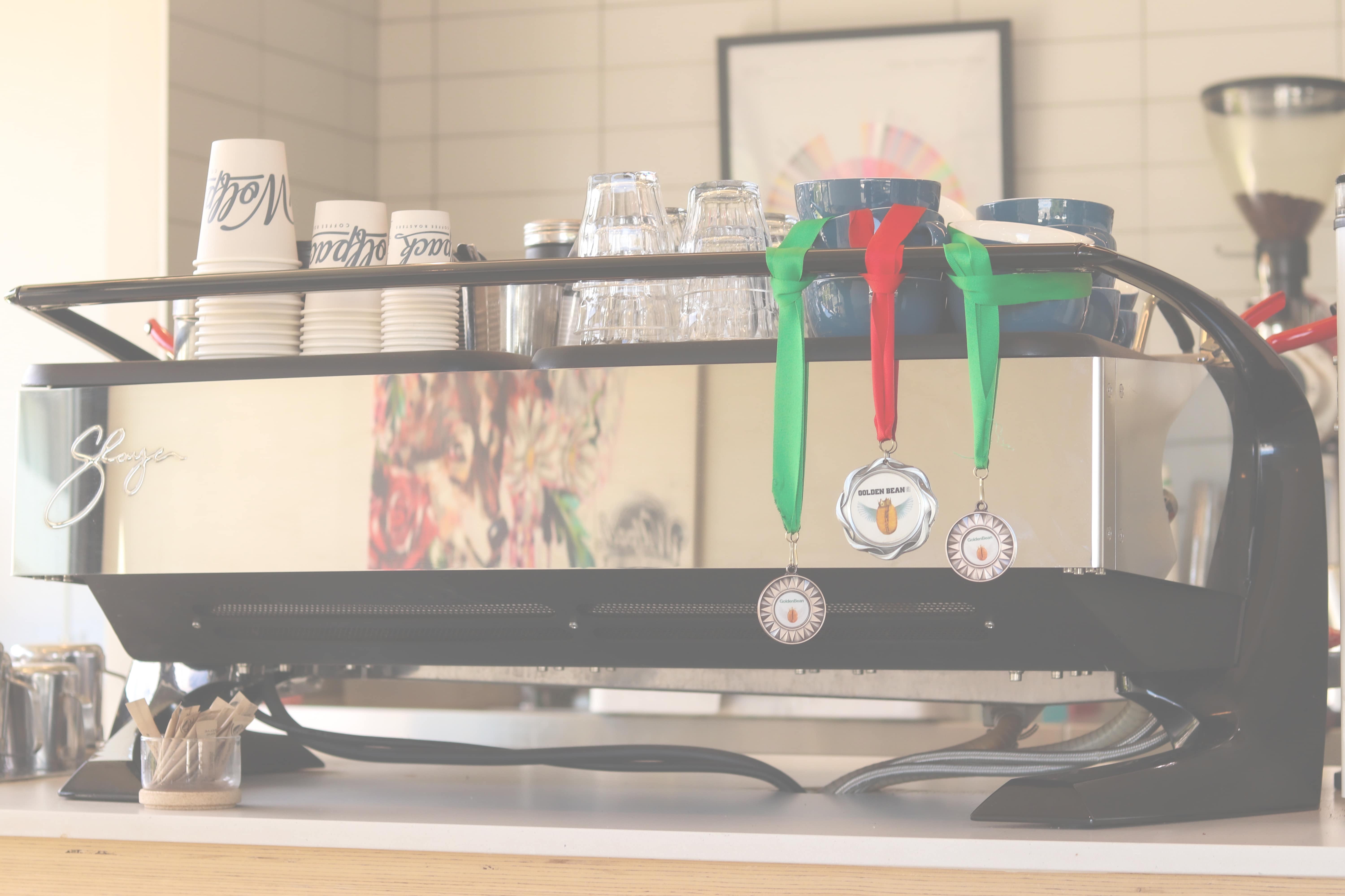 Barista preparing espresso at Wolfpack Coffee Roasters